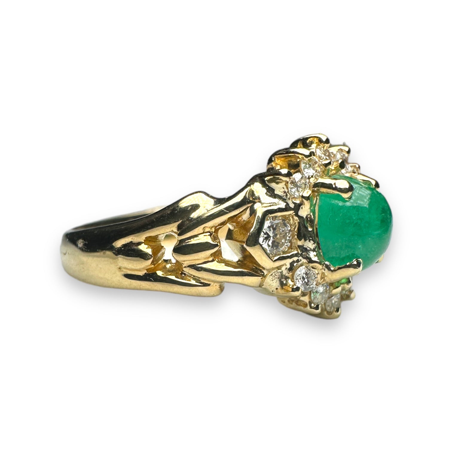 Emerald and diamond engagement ring