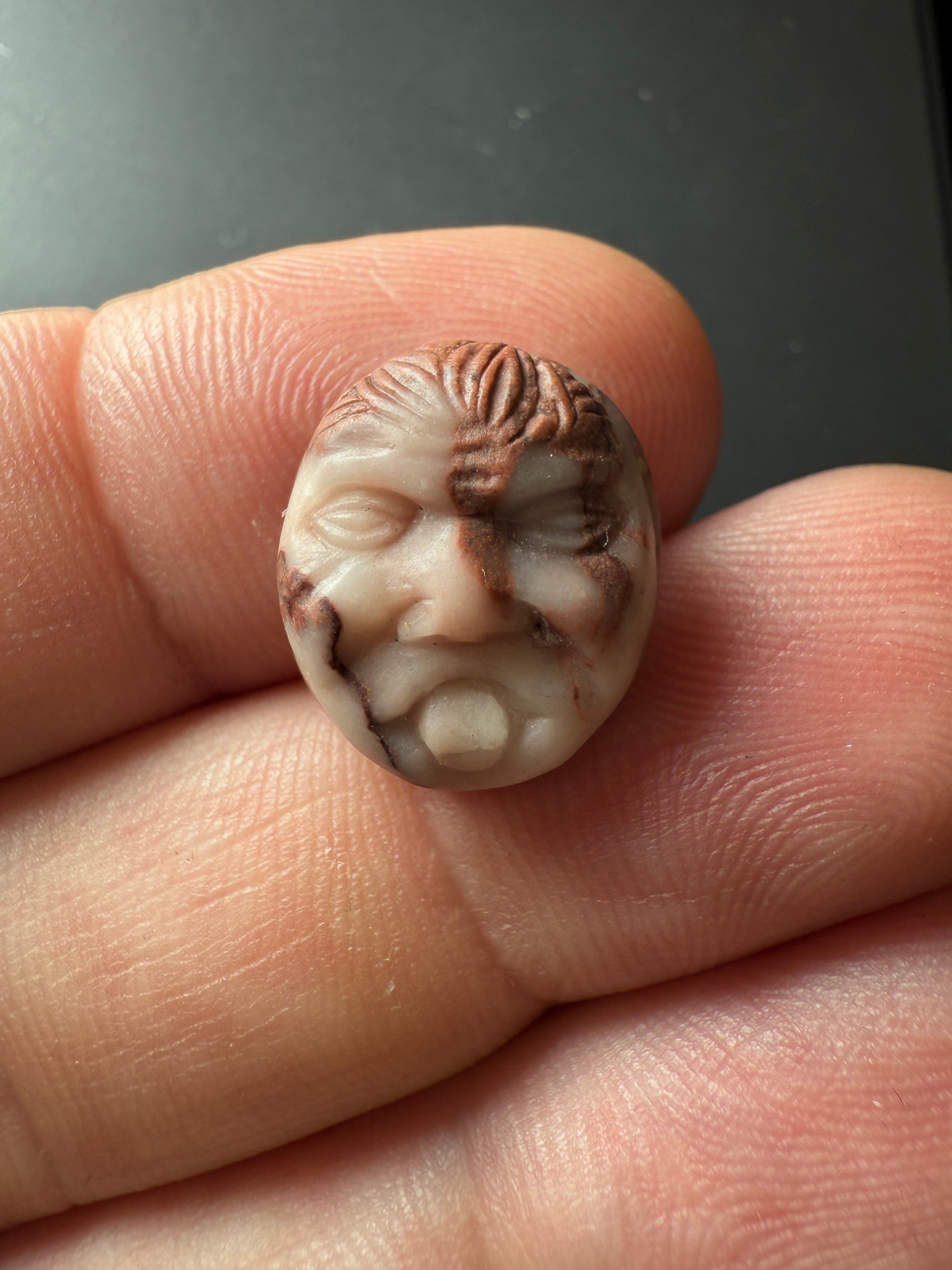 Hand-Carved Marble Face Amulet