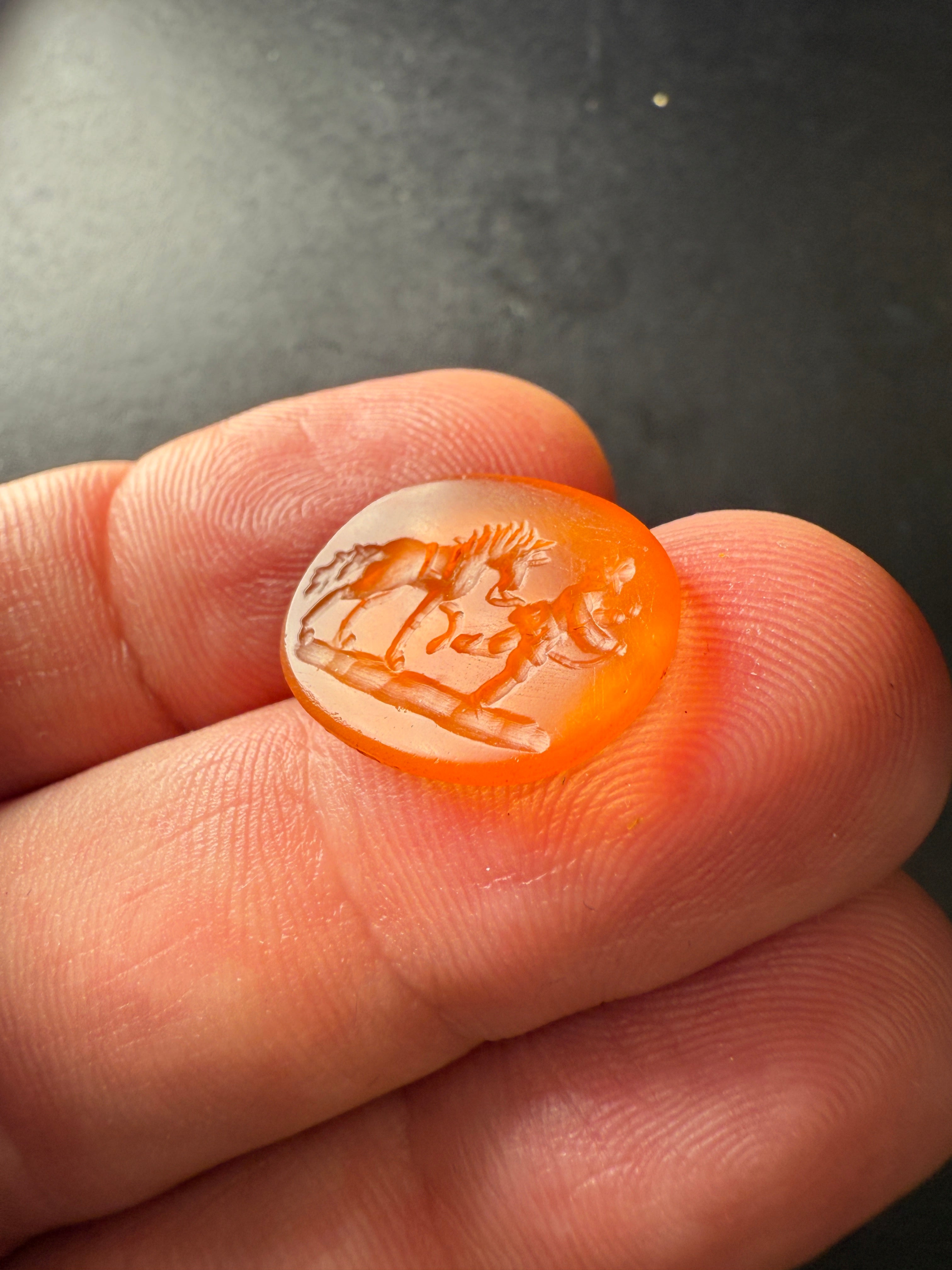 Antique Carved Stone Intaglio – Horse and Rider in Motion
Dimensions: 2.8 x 1.5 cm