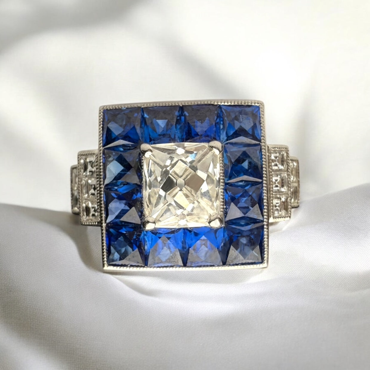 Diamond and sapphire engagement ring