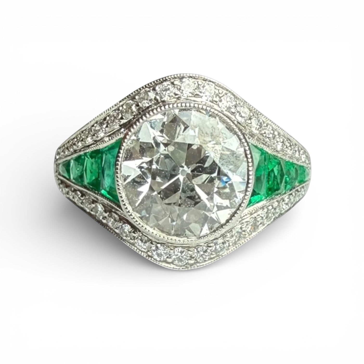 Diamond and emerald ring