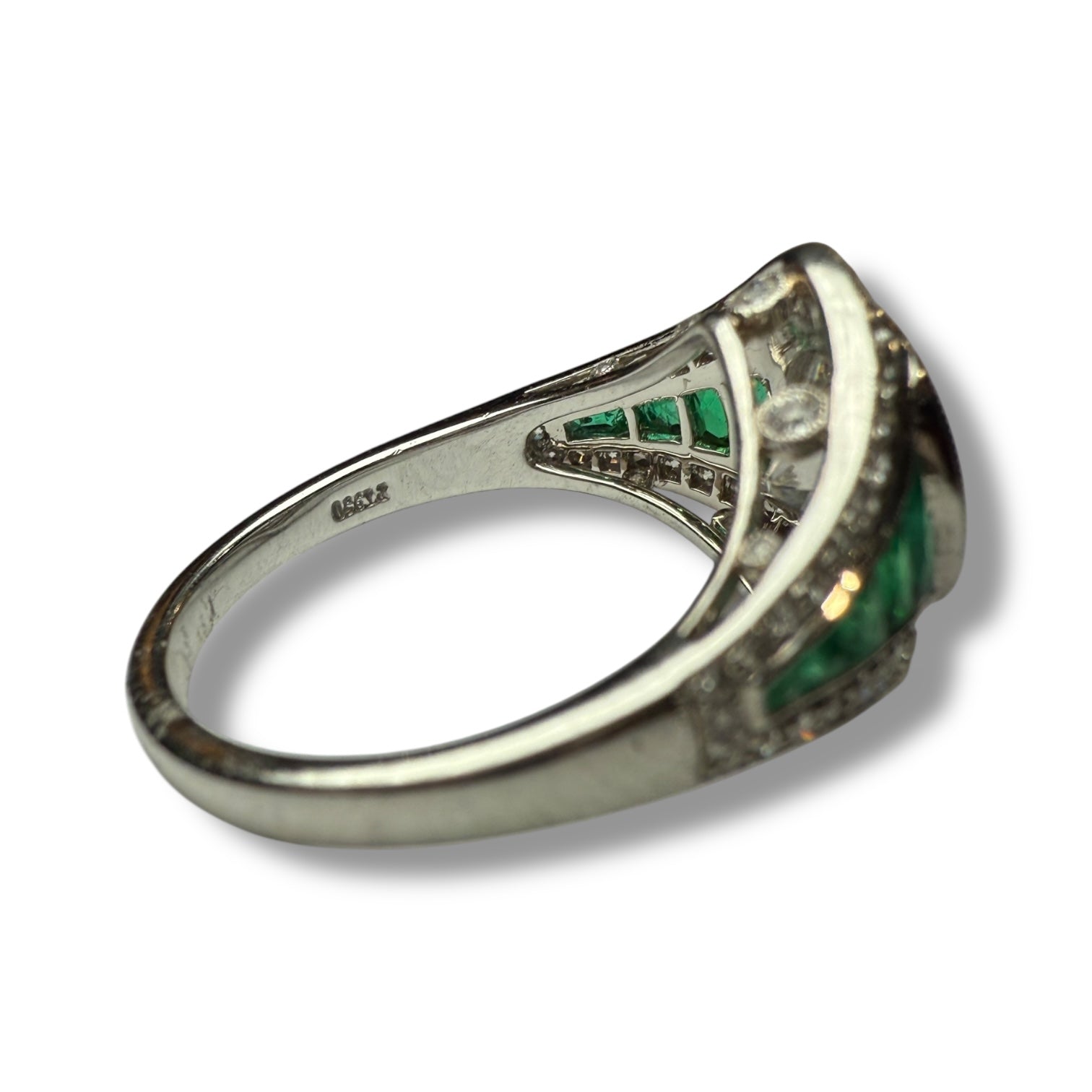 Diamond and emerald engagement ring