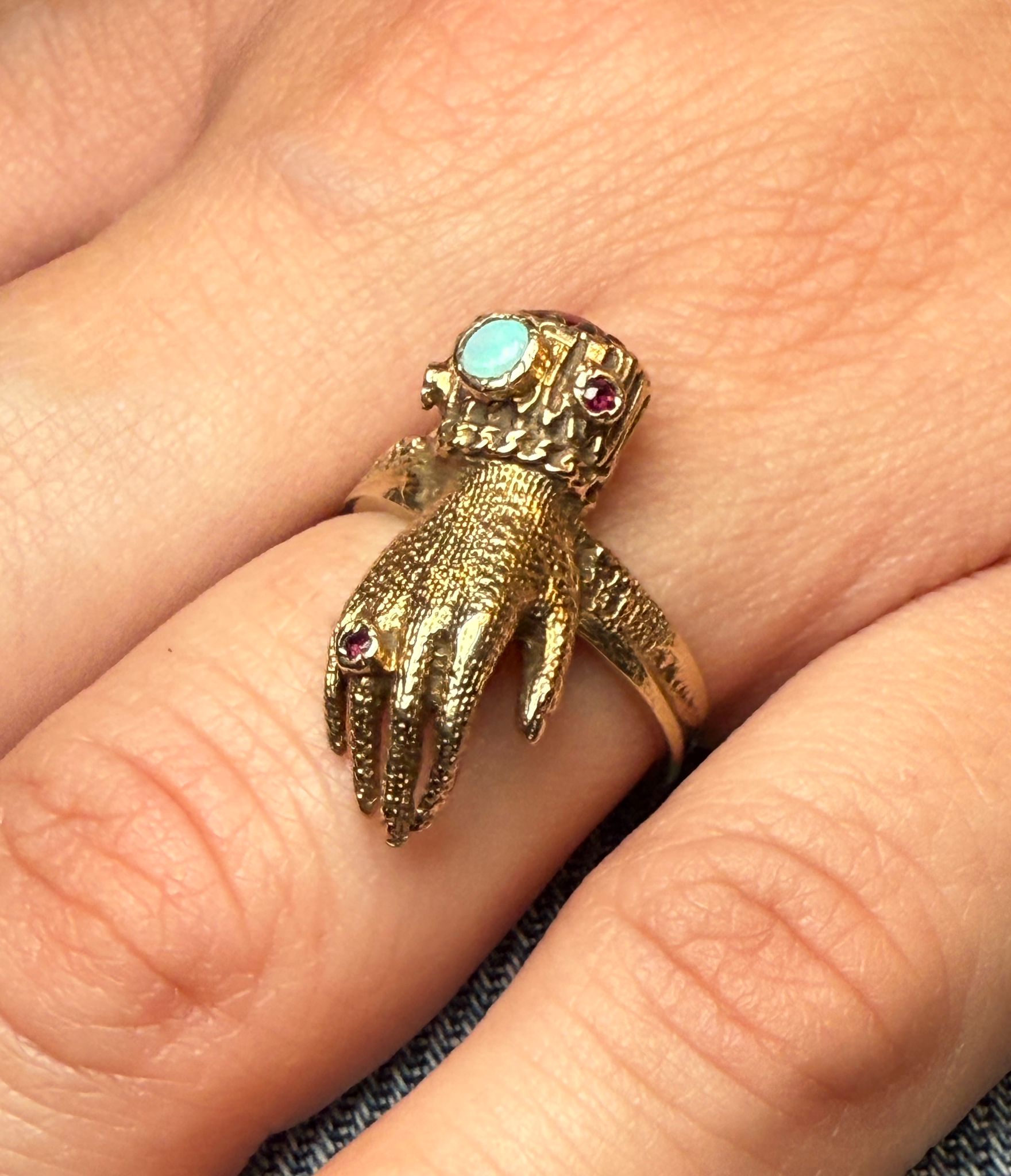 Gold hand ring with opal and garnet