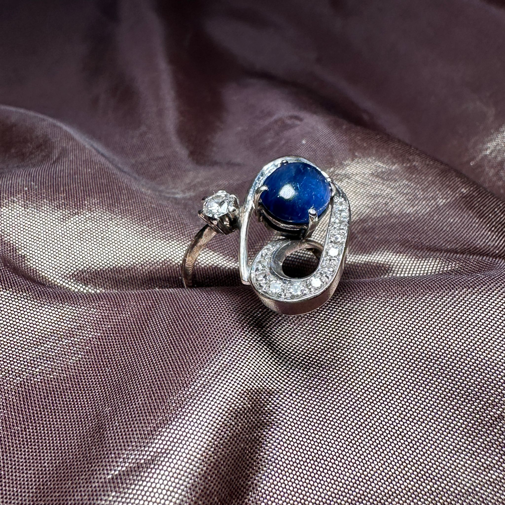 A sapphire and diamond ring