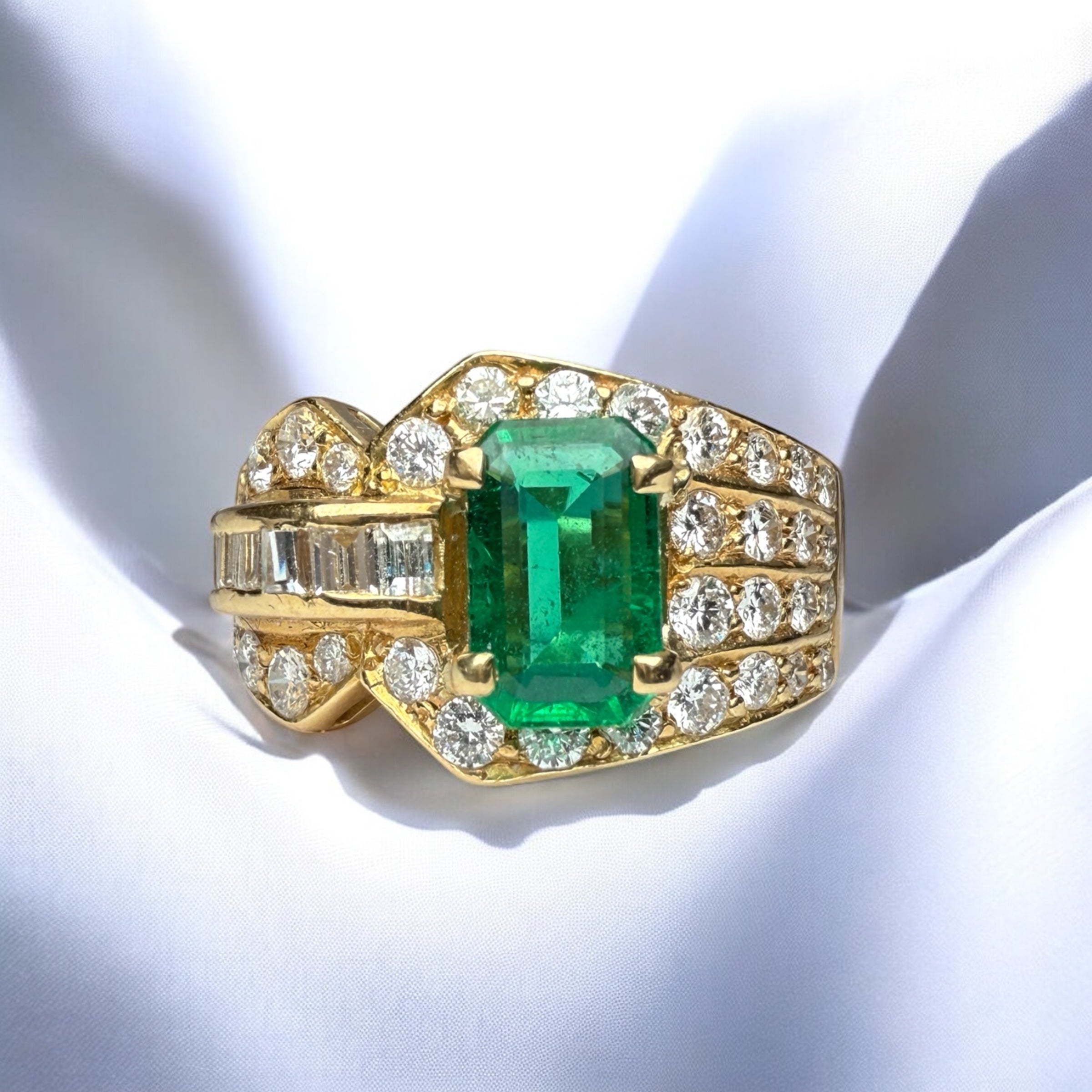 Emerald and diamond ring