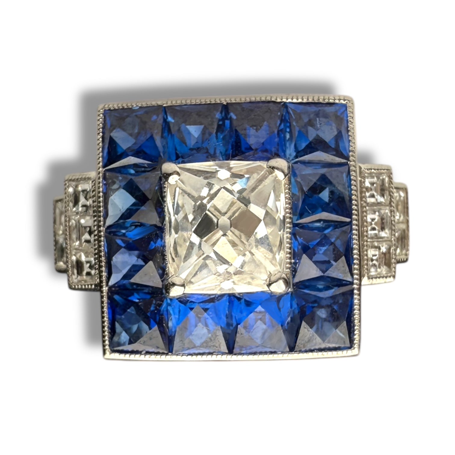 Diamond and sapphire engagement ring