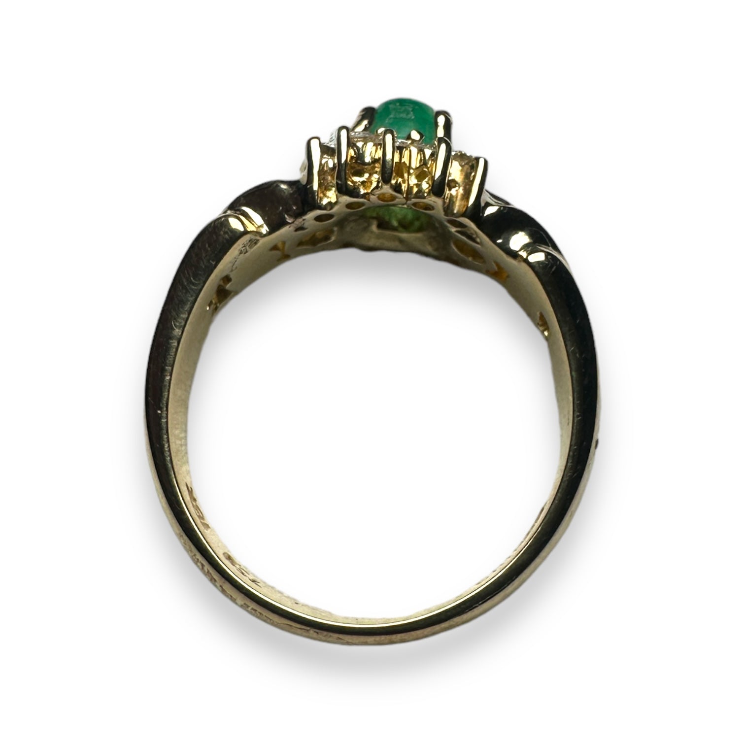 Emerald and diamond engagement ring