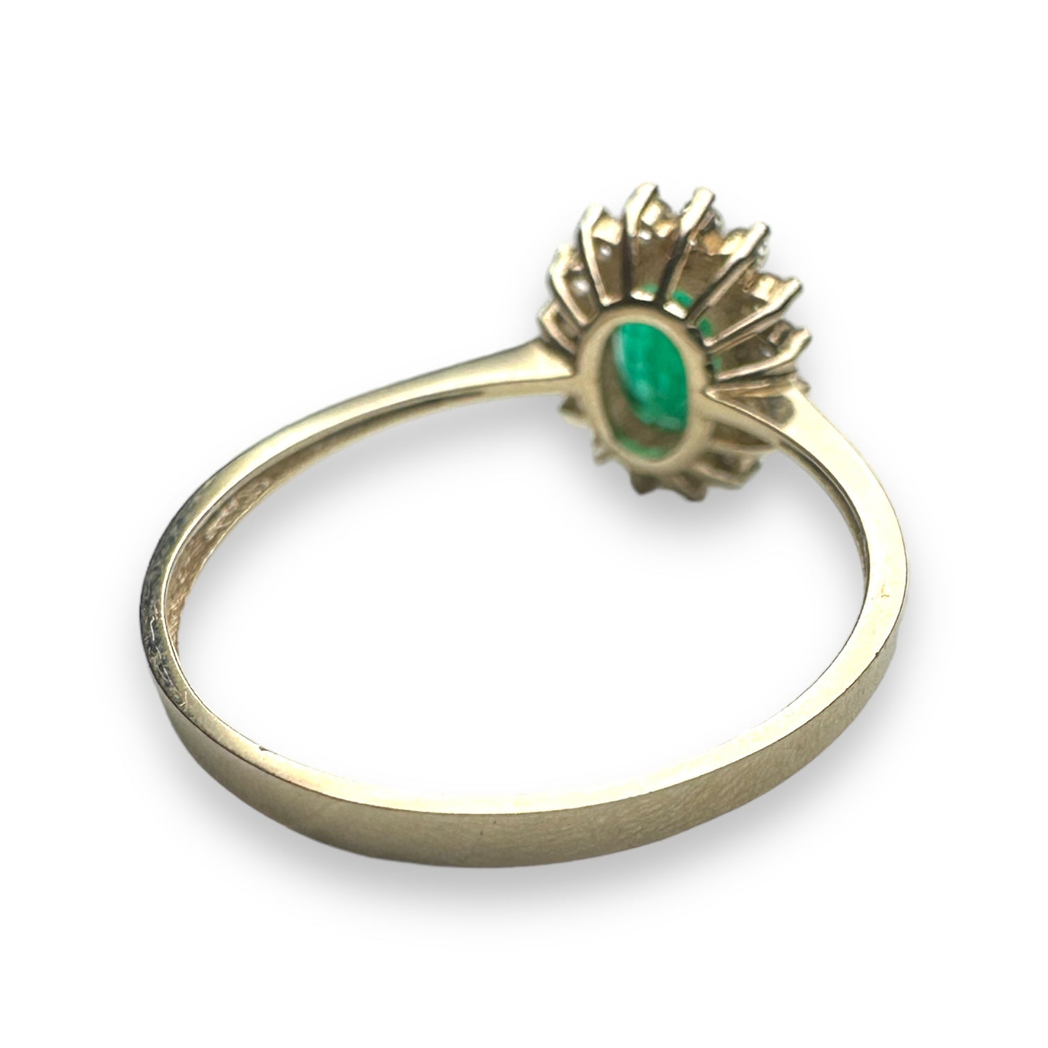 Emerald and diamond engagement ring