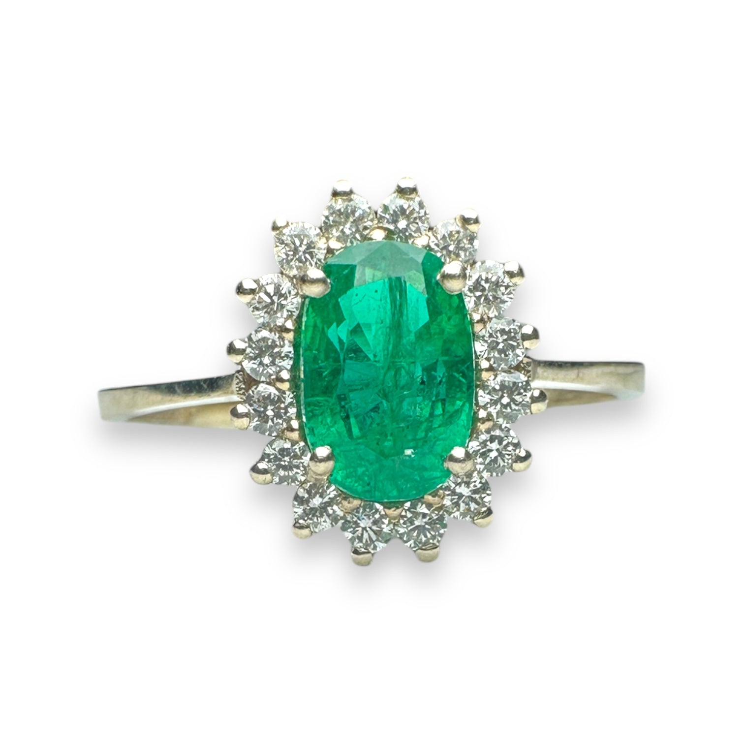Emerald and diamond engagement ring