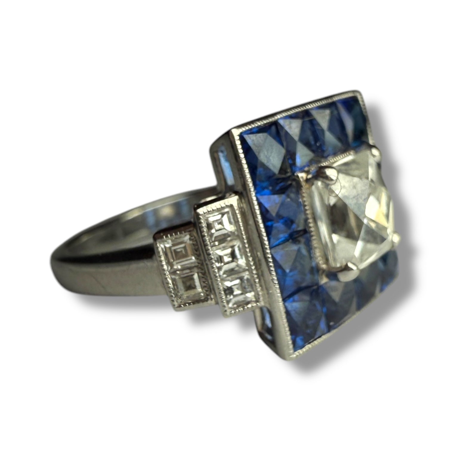 Diamond and sapphire engagement ring