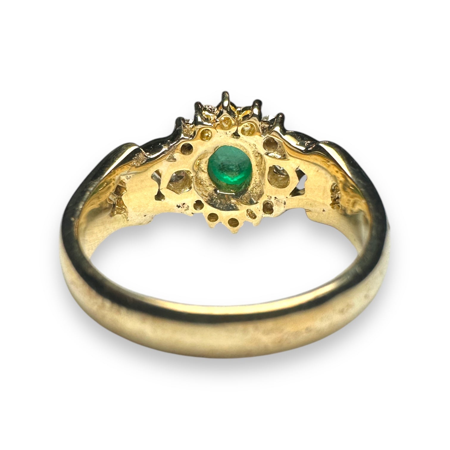 Emerald and diamond engagement ring