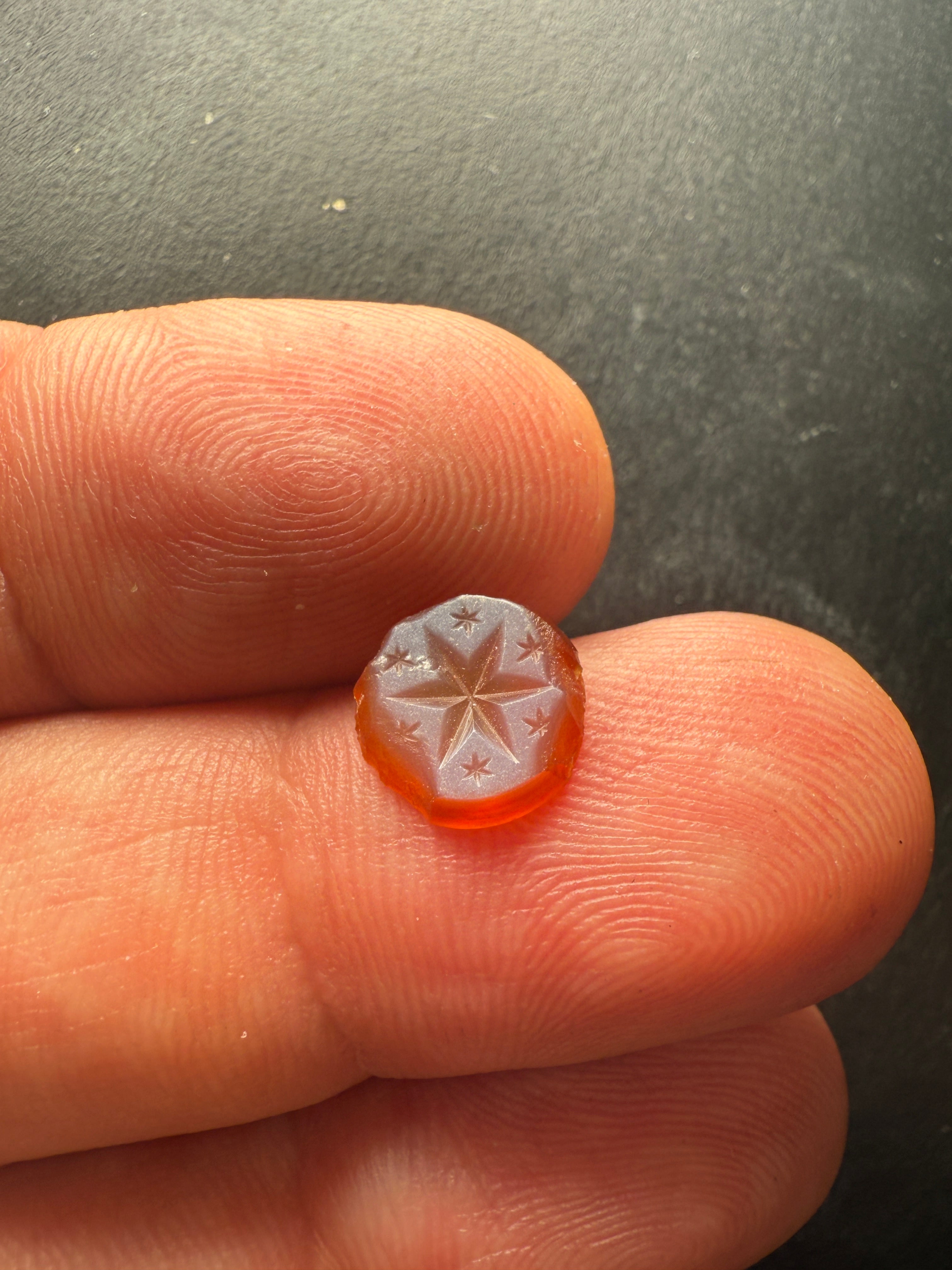 Miniature Star-Cut Carnelian Gemstone