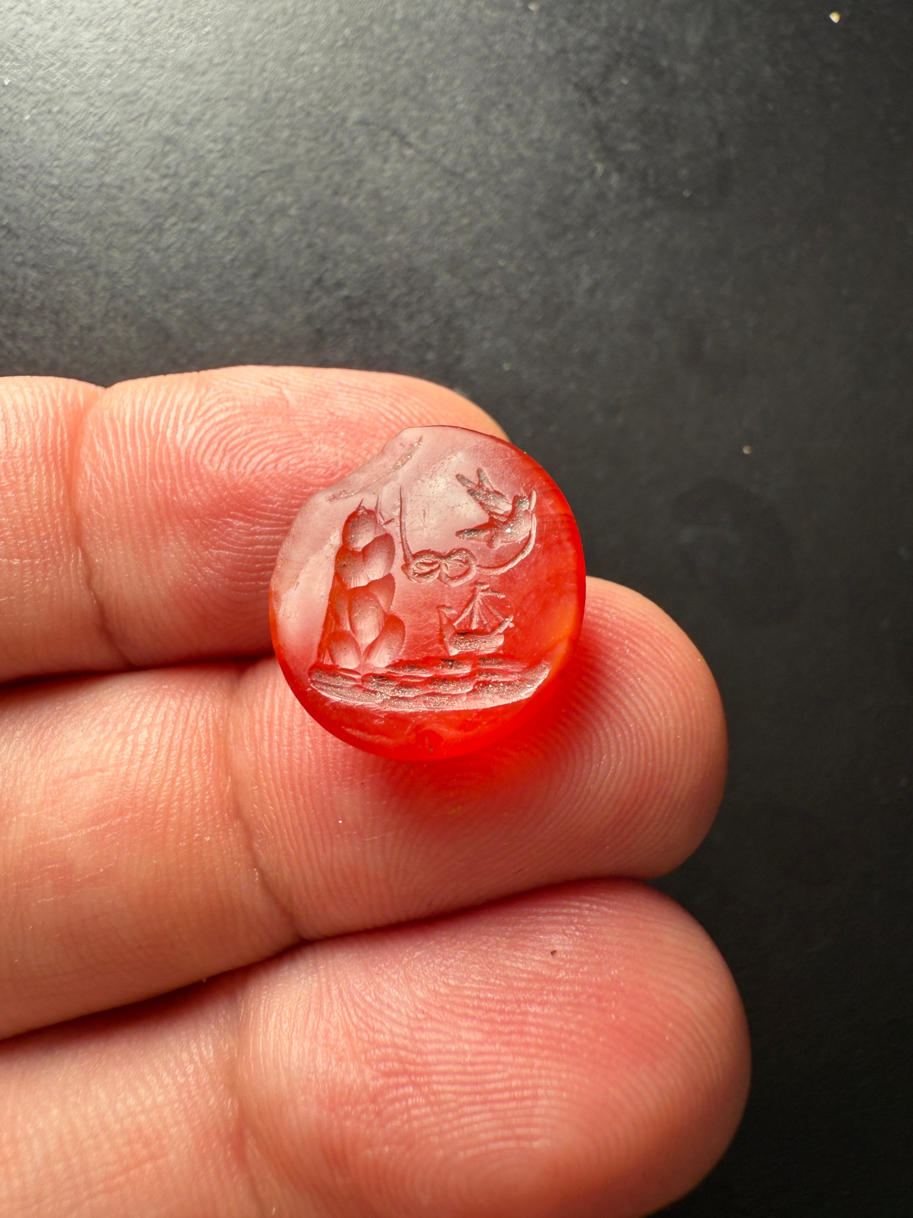 Antique Carved Stone Intaglio – Swallow, Ship & Anchor Scene
Dimensions: 1.9 x 1.7 cm