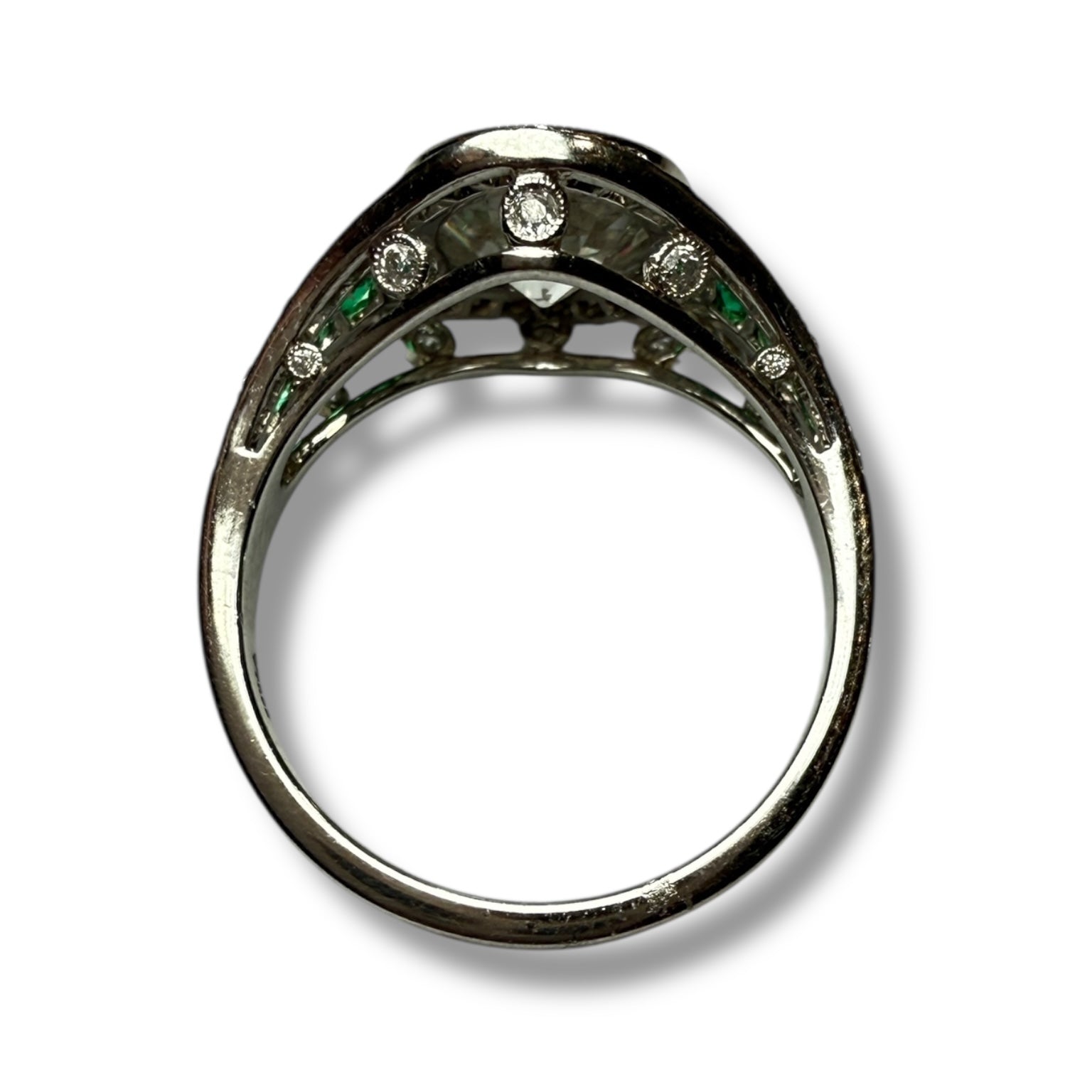 Diamond and emerald engagement ring