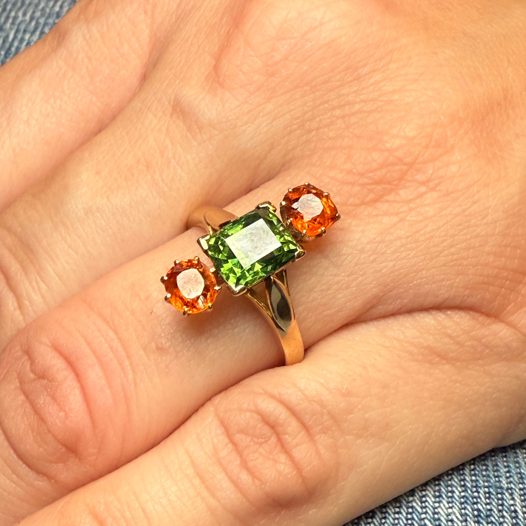 Green zircon and garnet ring