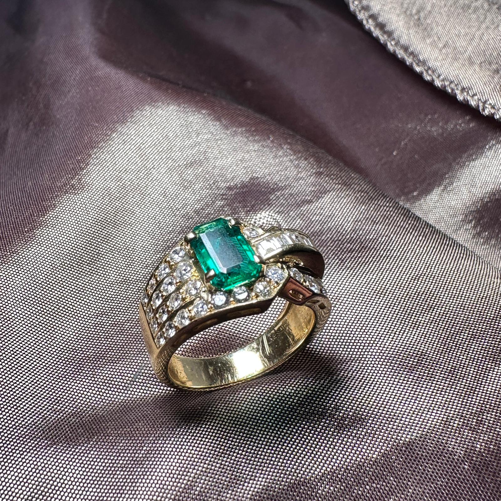 Emerald and diamond ring