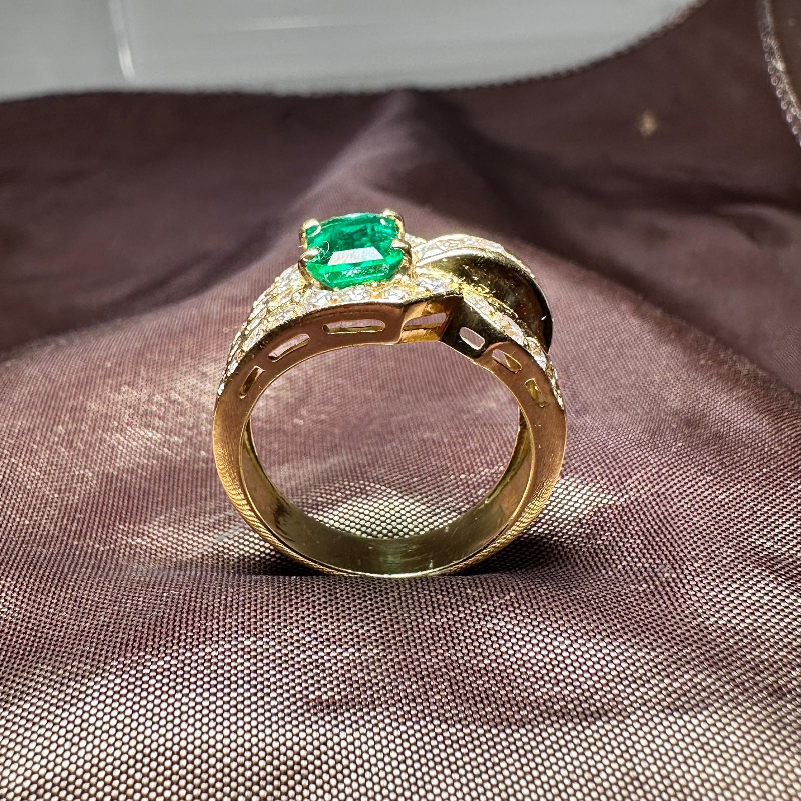 Emerald and diamond ring
