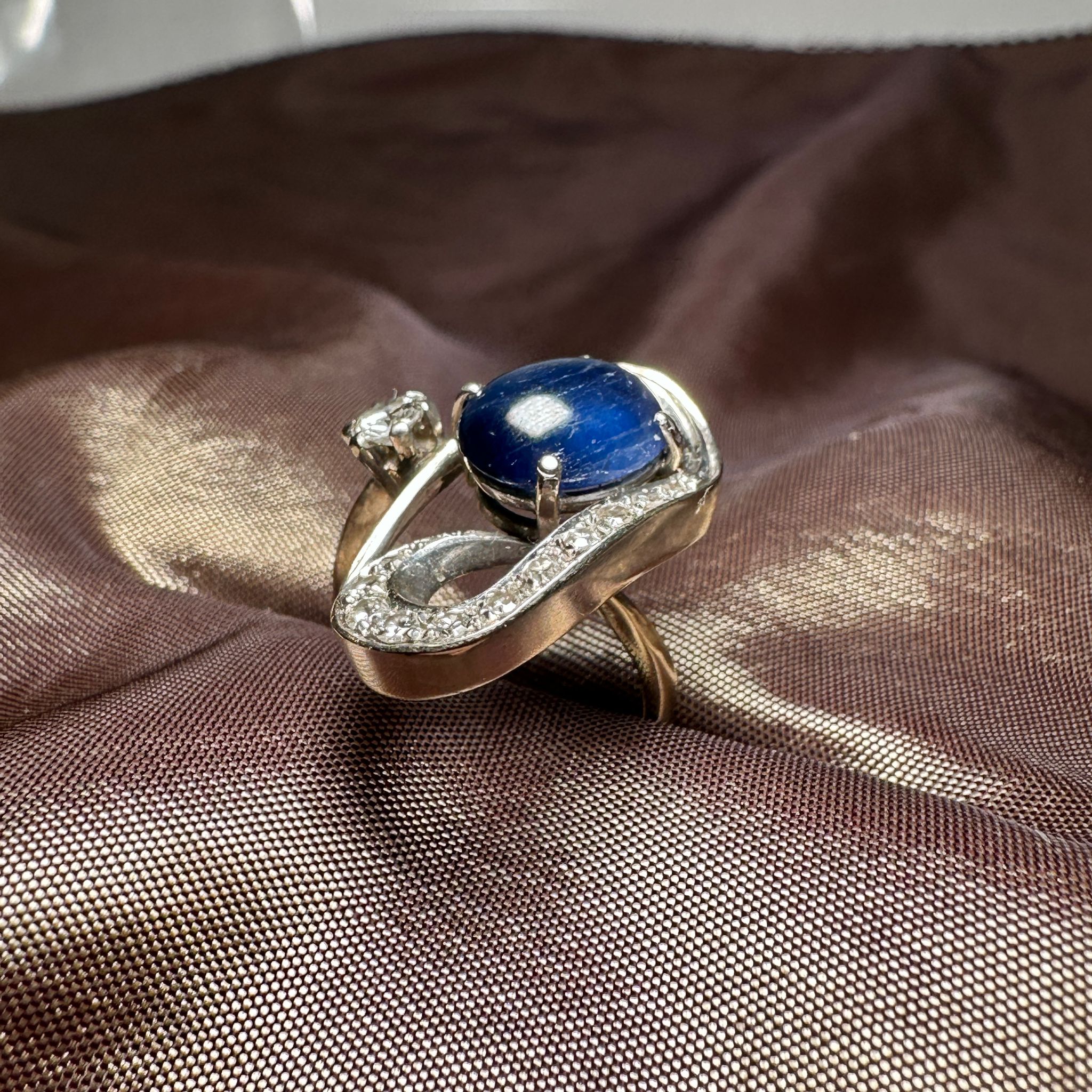 A sapphire and diamond ring
